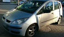 Mitsubishi colt блок керування склом двері