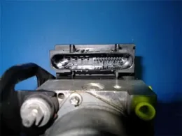 1N20437A0 блок управления ABS Mazda Familia