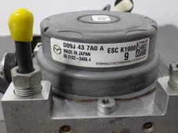 DDY1437A0A блок управления ABS Mazda Demio