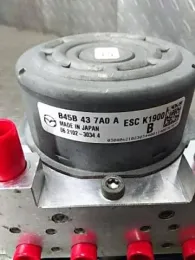 B4Y2437A0A блок керування ABS до Mazda Axela