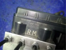 1M01437F0 блок управления ABS Mazda Familia